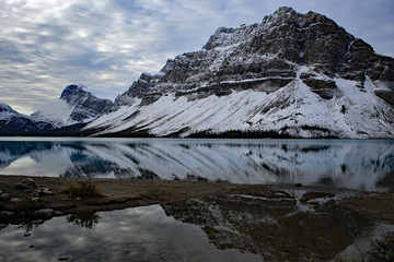 Breathtaking view on winter Bow lake in Canadian Rockies with blue sky