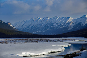 Gorgeous mountains covered in snow on a beautiful freezing winter day