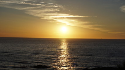 Fototapeta na wymiar Tramonto del sole al mare