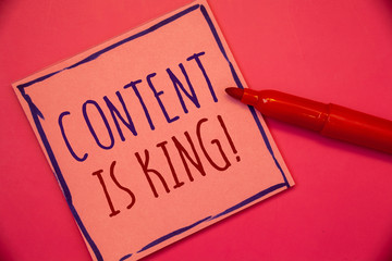 Writing note showing  Content Is King Motivational Call. Business photo showcasing Marketing Information Advertising Strategy Ideas concepts intentions on pink paper black letters frame red pen.