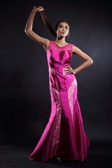 Asian woman in evening long ball dress