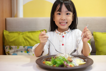 Asian Little Chinese Girl Eating Western Food