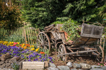 Old coach used as decoration in a garden