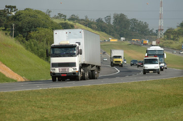 Fototapeta na wymiar no brand trucks, cars and ambulance on major highway