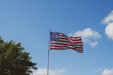 USA flag against blue sky