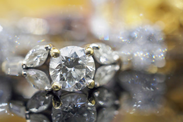 Luxury gold Jewelry diamond rings with reflection on black background