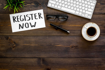 Membership concept. Template for registration. Register now hand lettering iconon word desk with...