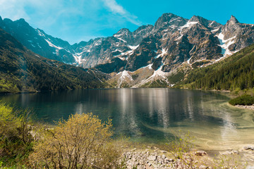 Fototapeta na wymiar Lake somewhere between forest and mountain