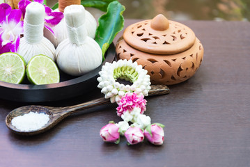 Spa massage compress balls, herbal ball on the wooden with treaments spa , Thailand, select focus
