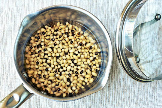 Black eyed beans soaked in water,  preparation for cooking.