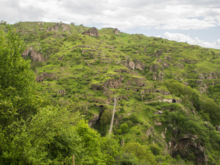 Fototapeta na wymiar Khndzoresk Swinging Bridge and Old Cave Village, Armenia 31