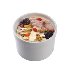 Chicken and herb soup in pot, Chinese food style.