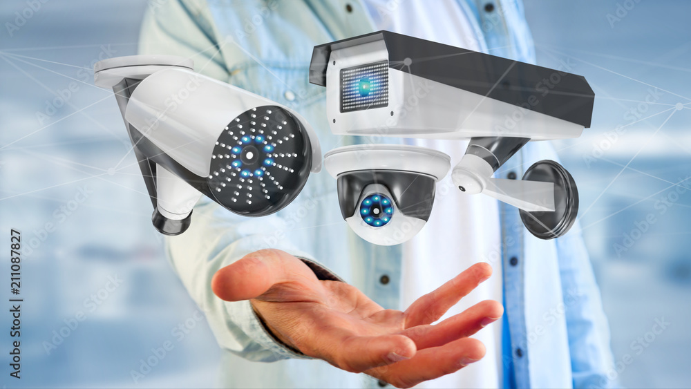 Poster businessman holding a security camera system and network connection - 3d rendering