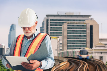 Portrait of service engineer holding clipboard checklist, Engineering and business concept