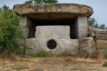 Mysterious ancient dolmen in the mountains Nexis near Gelendzhik, historical mystic relic