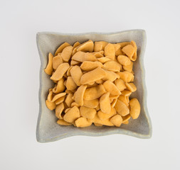 murukku or traditional indian snack on background.