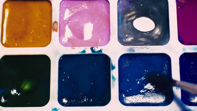old palette of watercolors closeup.