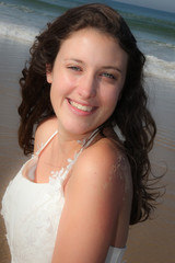 smile happy portrait of wet bride woman on sea beach