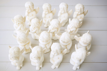 A little miniature statues angels with wings and halo.