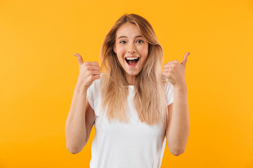 Portrait of an excited young blonde girl