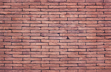 Old grungy texture, red brick wall with vintage style pattern for background and design art work.