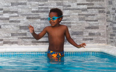 Little african child in the pool