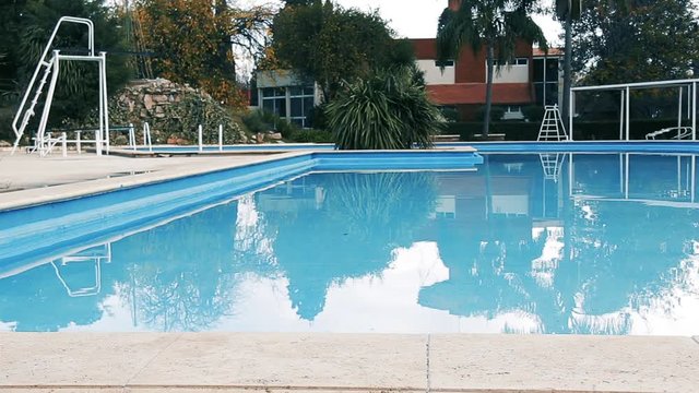 Empty Swimming Pool With Clean Water.