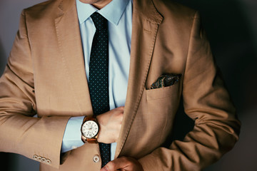 Businessman luxury style. Men style.closeup fashion image of luxury watch on wrist of man.body...