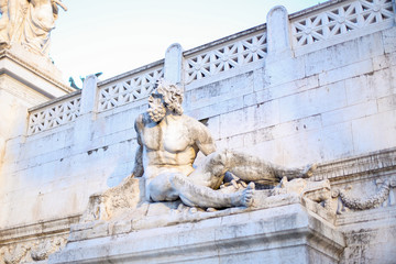 Old sculpture on building in Italy. Concept of traveling to Europe, Rome.