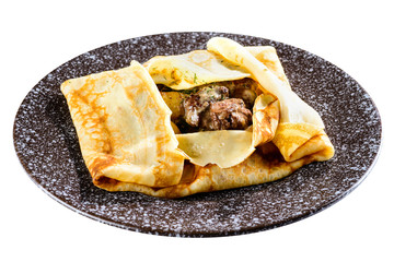 Delicious pancake blini with meat and potatoes isolated on white