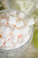  Pink marshmallows in a glass. Unusual dessert, table decoration