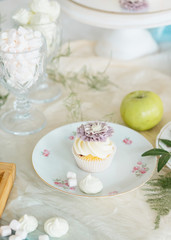 Obraz na płótnie Canvas Delicious cake with a flower of cream