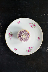 Delicious cake with a flower of cream