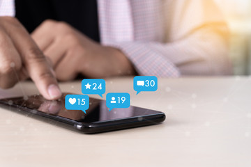 Young man using smart phone Social media and social network Marketing  concept People Connection