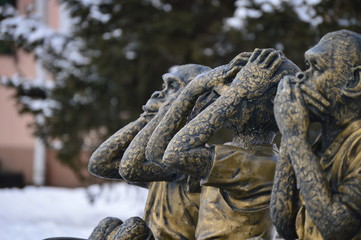 Gilded sculpture of three monkeys . I do not say , I do not see , can not hear. Installed in the city of Irkutsk.