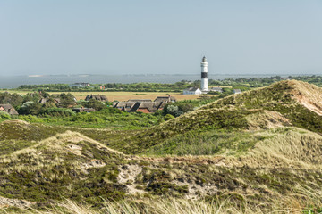 Fototapeta na wymiar Landschaft Dünen Küste Leuchtturm