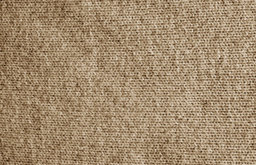 Knitting pattern in brown color.