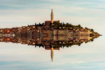 Abstract skiline of the old town of Rovinj, Istria, Croatia mirroring in the sea water. Rovinj city...