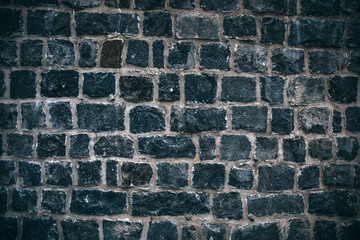 Black brick wall, dark background for design 