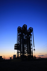 the tower type pumping unit in the evening