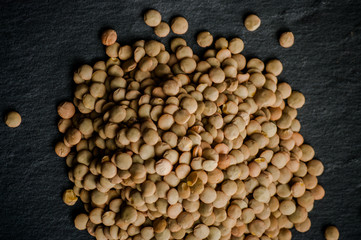 Dry Organic Brown Lentils against a background