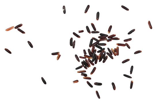 Organic black rice isolated on white background, top view