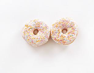 two donuts on a white background
