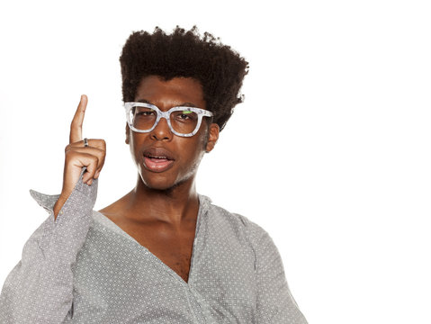 Young Handsome Afro American Hipster Guy Pointing Up Isolated On White Background. People Idea Concept