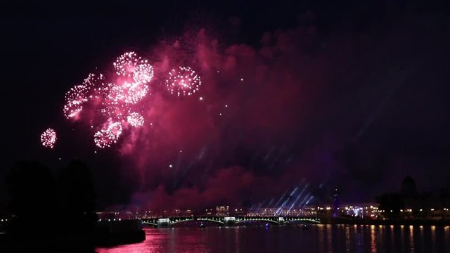 Glitter and Crackle Fireworks during FIFA World Cup 2018 Championship in Saint-Petersburg at Neva Water Area during White Nights shot from Tuchkov Bridge