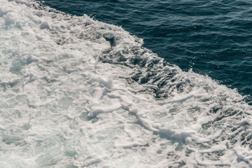 Wave of ship on water surface in the sea