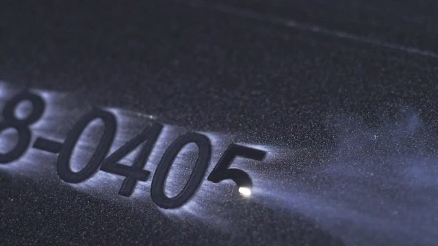 Laser Marking Machine Engraving. Manufacture of plastic water pipes of the factory. Process of making plastic tubes on the machine tool with the use of water and air pressure. Slow motion 180 fps.