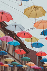 Fototapeta na wymiar umbrellas street
