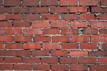 masonry of red brick. part of the wall. urban architecture.