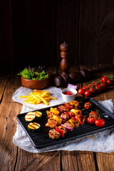 Rustic shish kebab skewers with marinated ham meat paprika and red onion